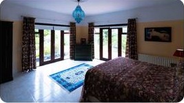Bedroom one with king bed