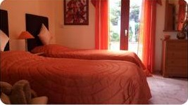 Bedroom two with two single beds